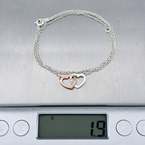 Footnote Sterling Silver Two Tone Cubic Zirconia Intertwined Heart Necklace - Picture 2 of 5